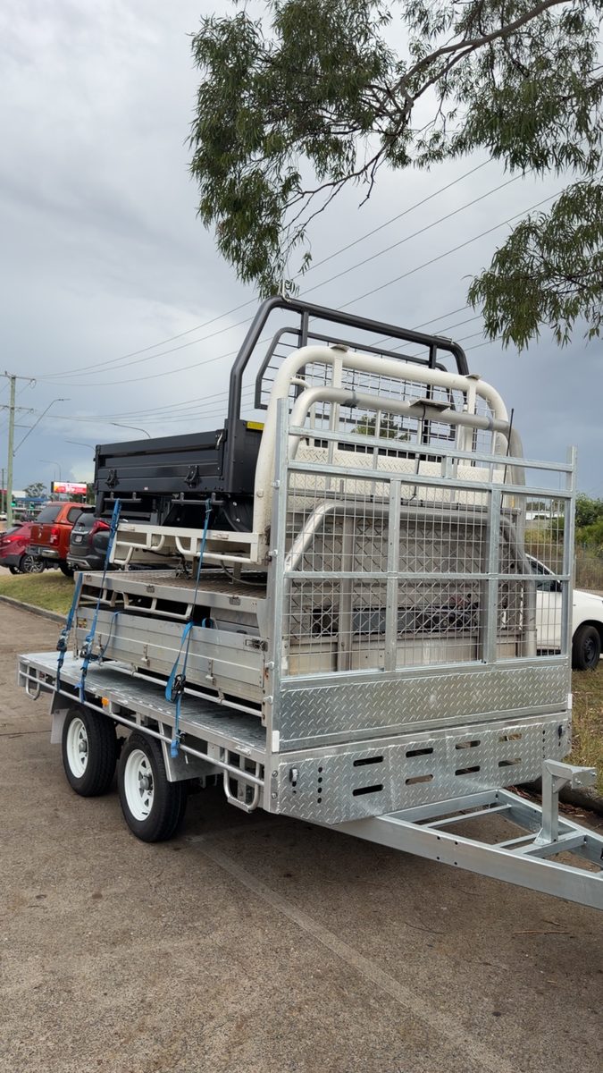 Used ute trays for sale stacked in the JCC Trays yard